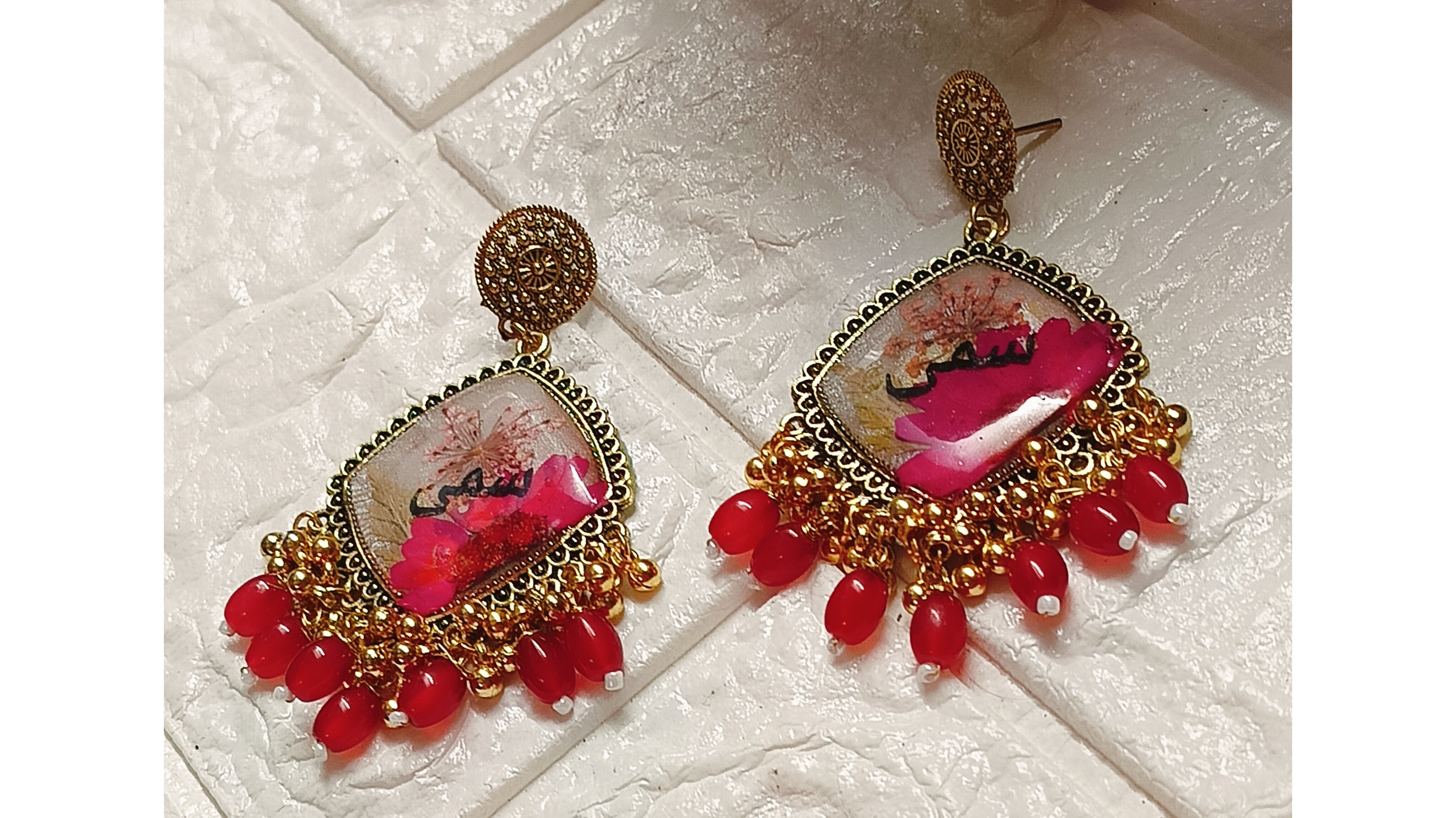 Maroon and white with name 